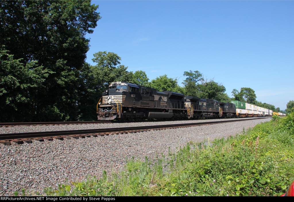 NS 1102 leads train 21J West past MP116